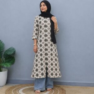 For women, imported straight kurta in rayon fabric in full sleeves off white with geometric prints.