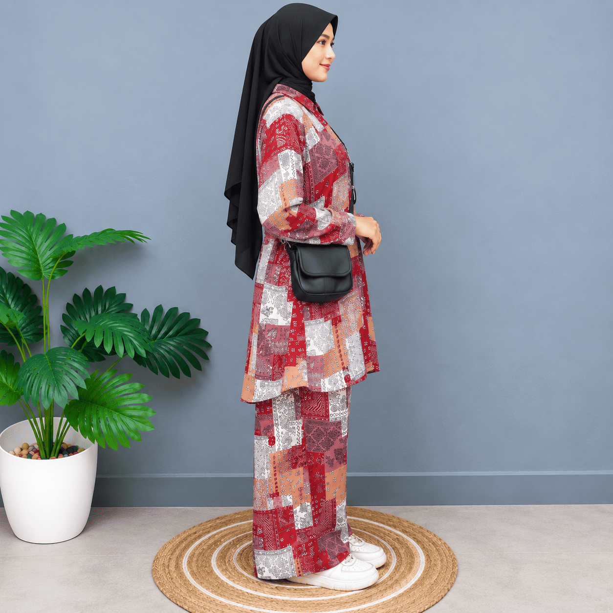 Side view of a red patchwork print shirt and matching wide-leg palazzo cord set.