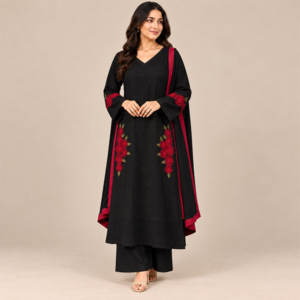 Woman in black kurta with red embroidery and dupatta. Woman in black kurta with red embroidery and dupatta.